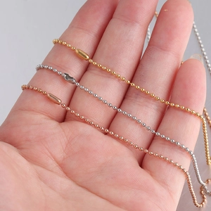 Detailed shot of 1.5mm stainless steel ball chains in gold, silver, and rose gold finishes