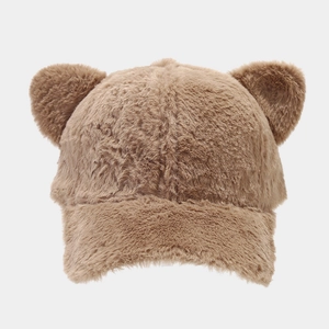 Detailed view of the soft brown plush texture and cute bear ears on the winter baseball cap