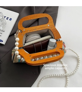 Top view of striped woven handbag showing large capacity for phone, wallet and cosmetics