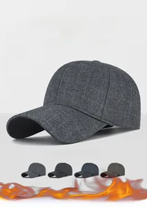 Close-up of winter plaid baseball cap showing soft wool texture and four color options