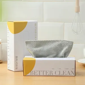 Absorbent microfiber cleaning cloths in a yellow and white dispenser box for home kitchens