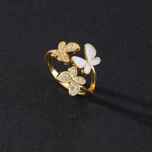 Elegant gold butterfly open ring with sparkling cubic zirconia and white shell details