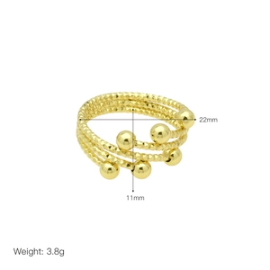 Detailed view of layered 18k gold plated ring with diamond texture and dimensions