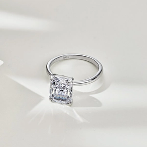 Macro shot of S925 sterling silver ring featuring a large emerald cut cubic zirconia