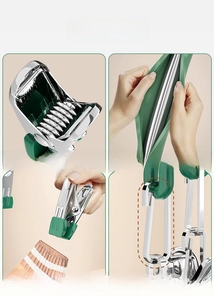 Macro view of stainless steel laundry clips with green non-slip soft rubber protective tips