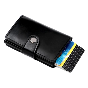 Detail view of the black RFID blocking wallet with multiple card slots and metal snap closure