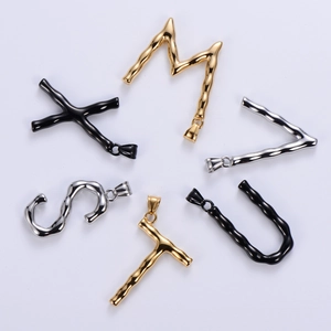Polished 18K gold stainless steel letter pendants in gold, silver, and black finishes