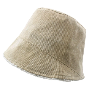 Close-up of light brown corduroy bucket hat with warm white faux shearling lining detail