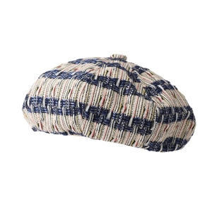 Classic tweed beret hat with colorful textured weave and decorative top button