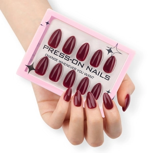 Glossy wine red press-on nails in oval shape with display box and hand demonstration