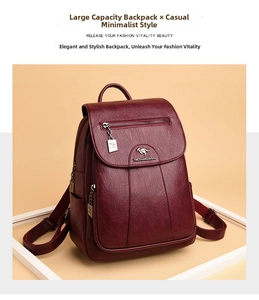 Detailed view of burgundy sheepskin texture and metal kangaroo logo on backpack