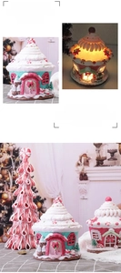Detail of glowing pink and mint candy house Christmas ornament with LED warm light