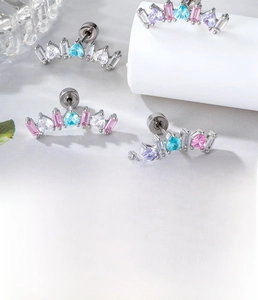 Close-up of crown stud earring in titanium steel with colorful zircon and flat disk back