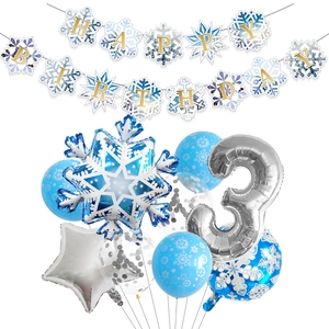 Blue and silver snowflake theme birthday party set with foil balloons and happy birthday banner