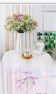 Detail of 108 heads artificial baby breath flower in Nordic style white pleated vase
