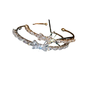 Elegant gold bow open bangle with sparkling cubic zirconia stones for women