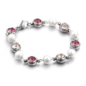 Pink and champagne crystal bracelet with white pearls and silver-tone chain on white background
