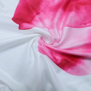 Detail shot of white and pink watercolor print fabric with a fine twill texture finish