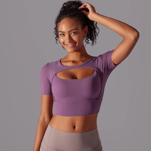 Close-up of lilac yoga short sleeve top featuring hollow-out chest design and premium texture