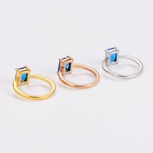 Luxurious stainless steel rings set with emerald-cut blue zircon stones for women
