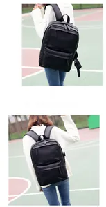 Detail of ergonomic padded straps on a minimalist black water-resistant travel backpack