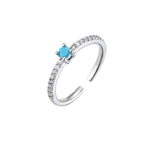 Detail of adjustable silver ring with turquoise stone and sparkling white cubic zirconia