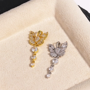 Elegant gold and silver butterfly tassel pendants with sparkling cubic zirconia stones