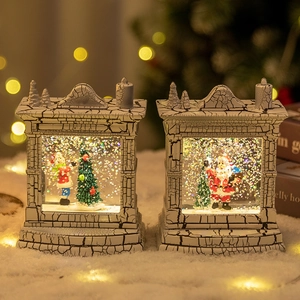 Vintage fireplace Christmas snow globe lantern with Santa Claus and glitter snow