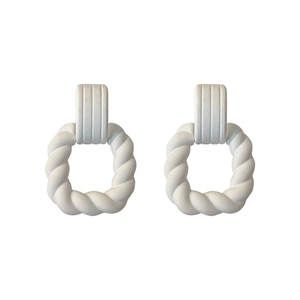 Vintage geometric twisted acrylic earrings with silver pins in matte white finish