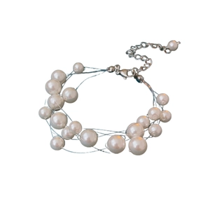 French style multilayered pearl beaded necklace with an elegant silver lobster clasp