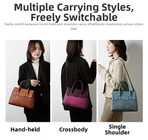 Three-way carry display of textured crocodile print tote bags in brown, wine, and blue