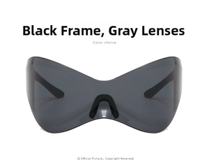 Detail view of large butterfly frame Y2K sunglasses in black with gray lenses