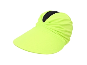 Detail of neon green sun visor with wide brim and flexible pleated fabric texture