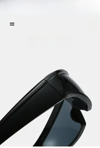 Detail view of lightweight flexible hinge on black Y2K sporty wraparound sunglasses