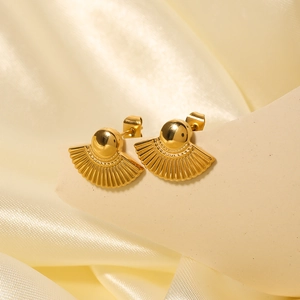 Chic 18K gold plated titanium steel fan-shaped stud earrings on soft beige silk fabric
