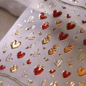 Luxury 3D heart nail stickers with gold crowns and metallic relief stars effect