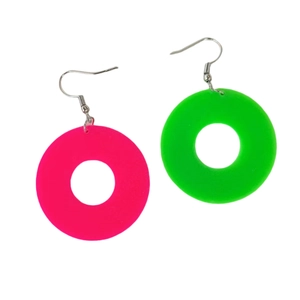 Detail of neon pink and green acrylic round earrings with geometric hollow design