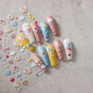 Close-up of 5D embossed nail stickers featuring cute bear and angel motifs, style TS-3676