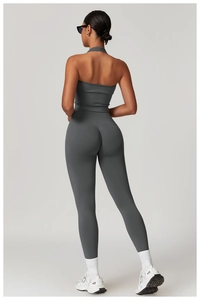 Detail view of high waist scrunch butt yoga leggings in dark grey seamless knit fabric