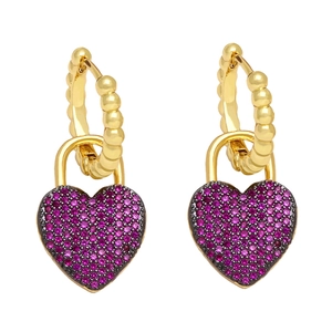 Elegant gold heart earrings with sparkling pink cubic zirconia stones on white backdrop