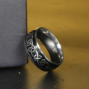 Nordic Celtic Knot stainless steel ring for men in black and silver finish on display