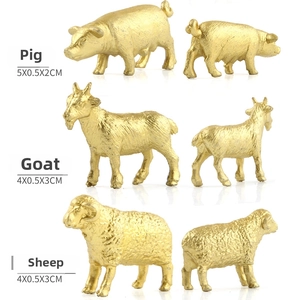 Detailed view of golden animal figurines with dimensions for pig, goat and sheep models