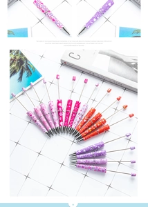 Detailed view of colorful DIY beadable pens with love heart and lip print patterns