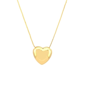 Minimalist gold heart pendant necklace with polished surface on a fine box chain