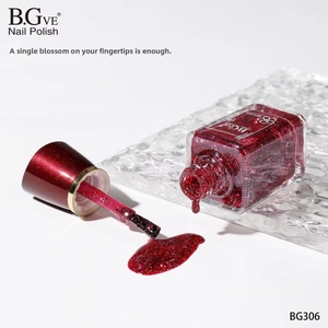 Close-up of BG306 red glitter nail polish bottle with brush showing shimmer texture