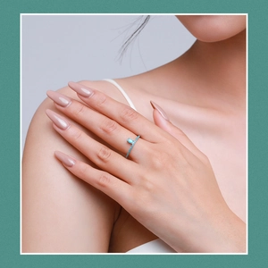 S925 silver ring with turquoise stone inlay on a female model finger stylish jewelry