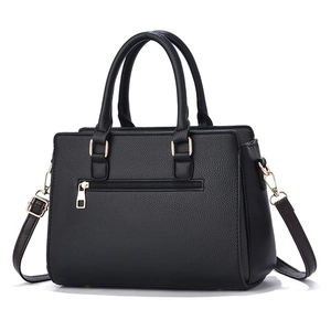 Classic black leather tote bag with pebble texture and adjustable gold hardware strap