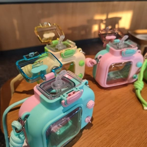 Creative TV-shaped kids water bottle with straw and adjustable strap in pastel colors