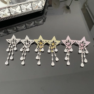 Lot de boucles d'oreilles étoiles à pampilles en argent, or et rose avec zircons brillants