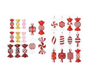 Macro detail of various colorful electroplated Christmas candy ornaments with spiral patterns